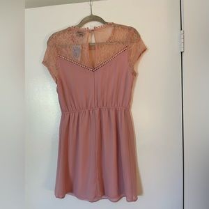 NEW. Never worn. pink mini dress with lace top